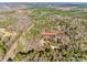 Aerial view of property; home near pond and road at 2292 Colony Acres Dr, Sharon, SC 29742