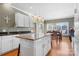 Kitchen with a large island, granite countertops, and breakfast area at 2425 Birdie Ne Ln, Conover, NC 28613