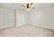 Bright bedroom with double door closet and ceiling fan at 3131 Pine Bluff Way, Fort Mill, SC 29707