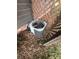 Outdoor air conditioning unit next to wooden lattice at 3217 Howe Dairy Rd, Gastonia, NC 28056