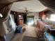 Kitchen with wood cabinets, stove, and refrigerator at 3217 Howe Dairy Rd, Gastonia, NC 28056