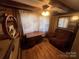 Cozy office or den with hardwood floors and a comfortable recliner at 3217 Howe Dairy Rd, Gastonia, NC 28056