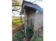 Small shed with a door and ivy growing on it at 3217 Howe Dairy Rd, Gastonia, NC 28056