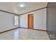 Bright bedroom with tile floors and window views at 3352 Bendwood Rd, Newton, NC 28658