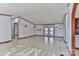 Bright living room with tile floors and view of backyard at 3352 Bendwood Rd, Newton, NC 28658