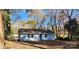 Charming light blue house with a backyard and trees at 3935 Amerigo St, Charlotte, NC 28208