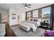 Large bedroom with plush carpet, gray walls, and ensuite bathroom access at 4128 Spring Cove Way, Belmont, NC 28012