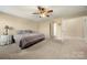 Main bedroom with ceiling fan and ensuite bath at 413 Landis Oak Way, Landis, NC 28088