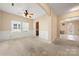 Dining room with carpeted floor and archways to other rooms at 413 Landis Oak Way, Landis, NC 28088