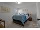 Bright bedroom with a comfortable bed and stylish decor at 6230 Durango Way, Denver, NC 28037