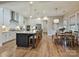 Modern kitchen with large island and breakfast area at 1426 Porch Wisdom Ct, Fort Mill, SC 29708