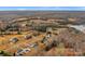 Aerial view showing neighborhood with houses and a lake in the distance at 1734 Dr Saye Ln, Sharon, SC 29742