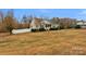 House exterior showcasing a beige facade and landscaping at 1734 Dr Saye Ln, Sharon, SC 29742