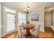 Charming dining room featuring hardwood floors and a lovely chandelier at 1739 Craven Hill Dr, Rock Hill, SC 29730