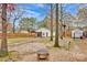 Large backyard with firepit, workshop, and playset at 2005 Wilson Ave, Monroe, NC 28110