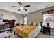 Spacious bedroom with a home office setup and large window at 2005 Wilson Ave, Monroe, NC 28110