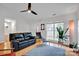 Living room with hardwood floors and a cozy fireplace at 2005 Wilson Ave, Monroe, NC 28110