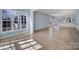 Spacious dining room with light hardwood floors and large windows at 3094 Azalea Dr, Fort Mill, SC 29707