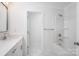 Clean bathroom with single vanity, shower/tub combo, and marble floor at 3110 Westerwood Dr, Charlotte, NC 28214