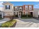 Attractive two-story townhome with a paved driveway and landscaped front yard at 325 River Clay Rd, Fort Mill, SC 29708