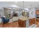 Open concept kitchen overlooking the living room with a large island at 3705 Elk Way, Indian Trail, NC 28079