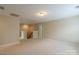 Open bonus room perfect for a home office or play area at 7120 Kinley Commons Ln, Charlotte, NC 28278