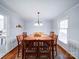 Dining room with hardwood floors and large table at 816 Applegate Ct, Gastonia, NC 28054