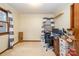 Bright bedroom with window, carpeting, and built-in desk at 8214 Addison Dr, Harrisburg, NC 28075