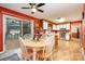 Kitchen with a table for four and access to deck at 8214 Addison Dr, Harrisburg, NC 28075