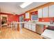 Kitchen with white cabinets and stainless steel appliances at 8214 Addison Dr, Harrisburg, NC 28075