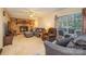 Living room with fireplace and access to deck at 8214 Addison Dr, Harrisburg, NC 28075