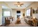 Living room with fireplace, neutral decor, and hardwood floors at 922 Back Bay Ne Ct, Kannapolis, NC 28083