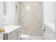 Modern bathroom with a walk-in shower and light marble tile at 107 Grand Canyon Rd, Stanley, NC 28164