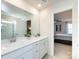 Bathroom featuring double vanity and bedroom view at 15533 Capps Rd, Charlotte, NC 28278