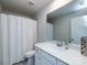 Clean bathroom with shower, toilet and vanity at 15533 Capps Rd, Charlotte, NC 28278