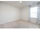 Spacious bedroom with carpeted floor and window at 15533 Capps Rd, Charlotte, NC 28278