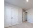 Bedroom with double doors and access to another room at 15533 Capps Rd, Charlotte, NC 28278