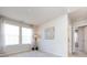 Charming bedroom with window, wall decor and access to bathroom at 15533 Capps Rd, Charlotte, NC 28278