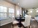Casual dining area with view into the living room at 15533 Capps Rd, Charlotte, NC 28278