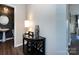 Elegant entryway with half bathroom and a stylish console table at 15533 Capps Rd, Charlotte, NC 28278