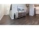 Entryway with dark hardwood floors, and a modern console table at 15533 Capps Rd, Charlotte, NC 28278