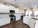 Spacious kitchen featuring an island and stainless steel appliances at 15533 Capps Rd, Charlotte, NC 28278
