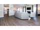 Spacious living room with hardwood floors, fireplace, and sectional sofa at 15533 Capps Rd, Charlotte, NC 28278