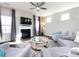 Spacious living room featuring a fireplace and ample natural light at 15533 Capps Rd, Charlotte, NC 28278