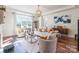 Living room with large window and hardwood floors at 2005 Pinefield Ct, Gastonia, NC 28056