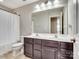 Bathroom with double vanity and large mirror at 316 Weavers Glenn Pl, Charlotte, NC 28262