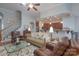 Bright living room with hardwood floors, comfortable seating, and open kitchen view at 336 Windell Dr, Fort Mill, SC 29708