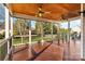 Screened-in porch with ceiling fans, providing shaded outdoor area at 4263 Belle Meade Cir, Belmont, NC 28012