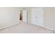 Spacious bedroom with double-door closet and neutral decor at 5026 Wild Wing Dr, Gastonia, NC 28052