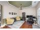 Bright dining room with hardwood floors, chandelier, and built-in shelving at 6428 Hasley Woods Dr, Huntersville, NC 28078